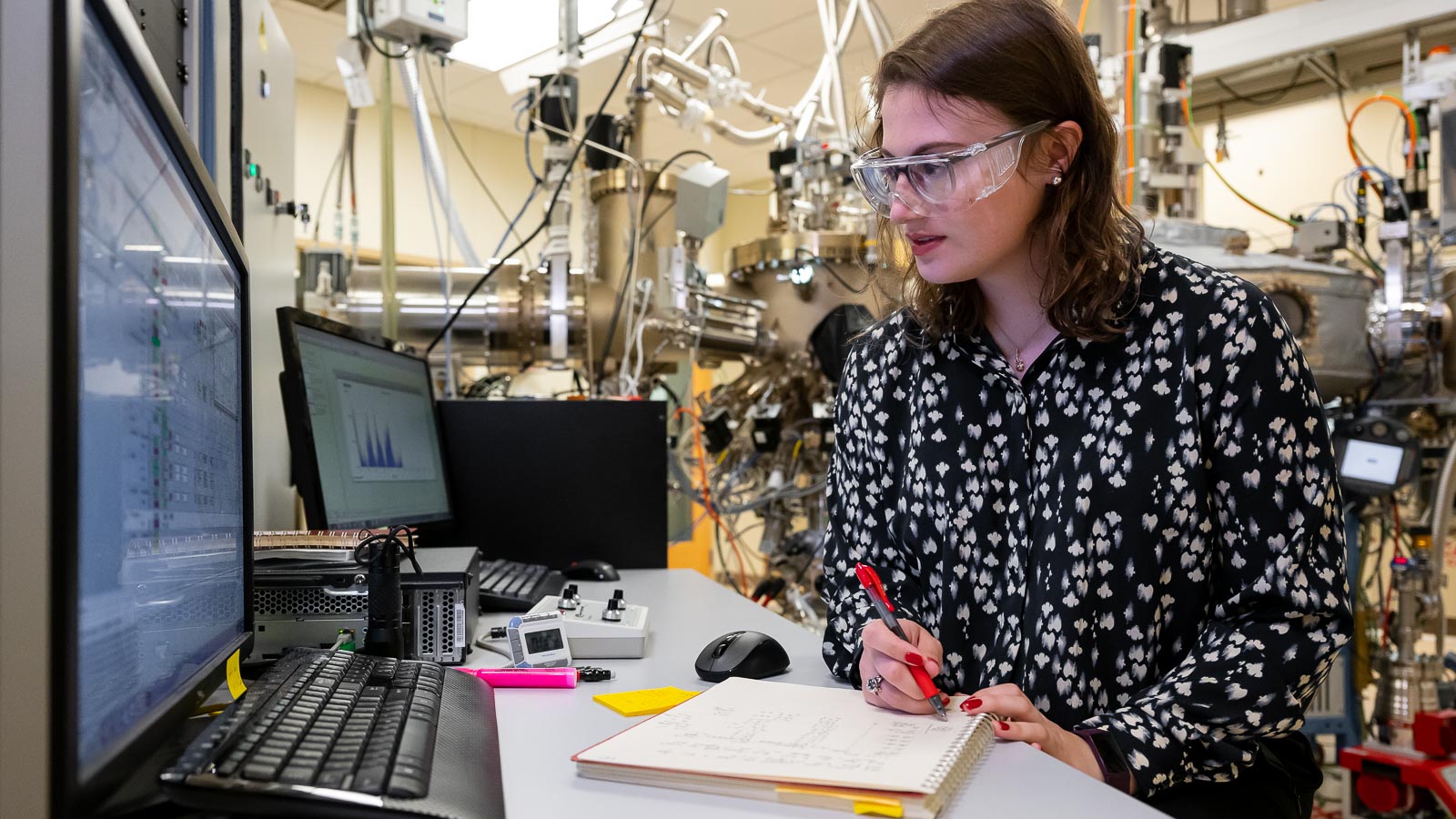 Katie Sautter is a postdoctoral researcher in Supratik Guha's lab at Argonne National Laboratory. She builds materials for quantum devices using a molecular beam epitaxy machine. (Image by Argonne National Laboratory.)